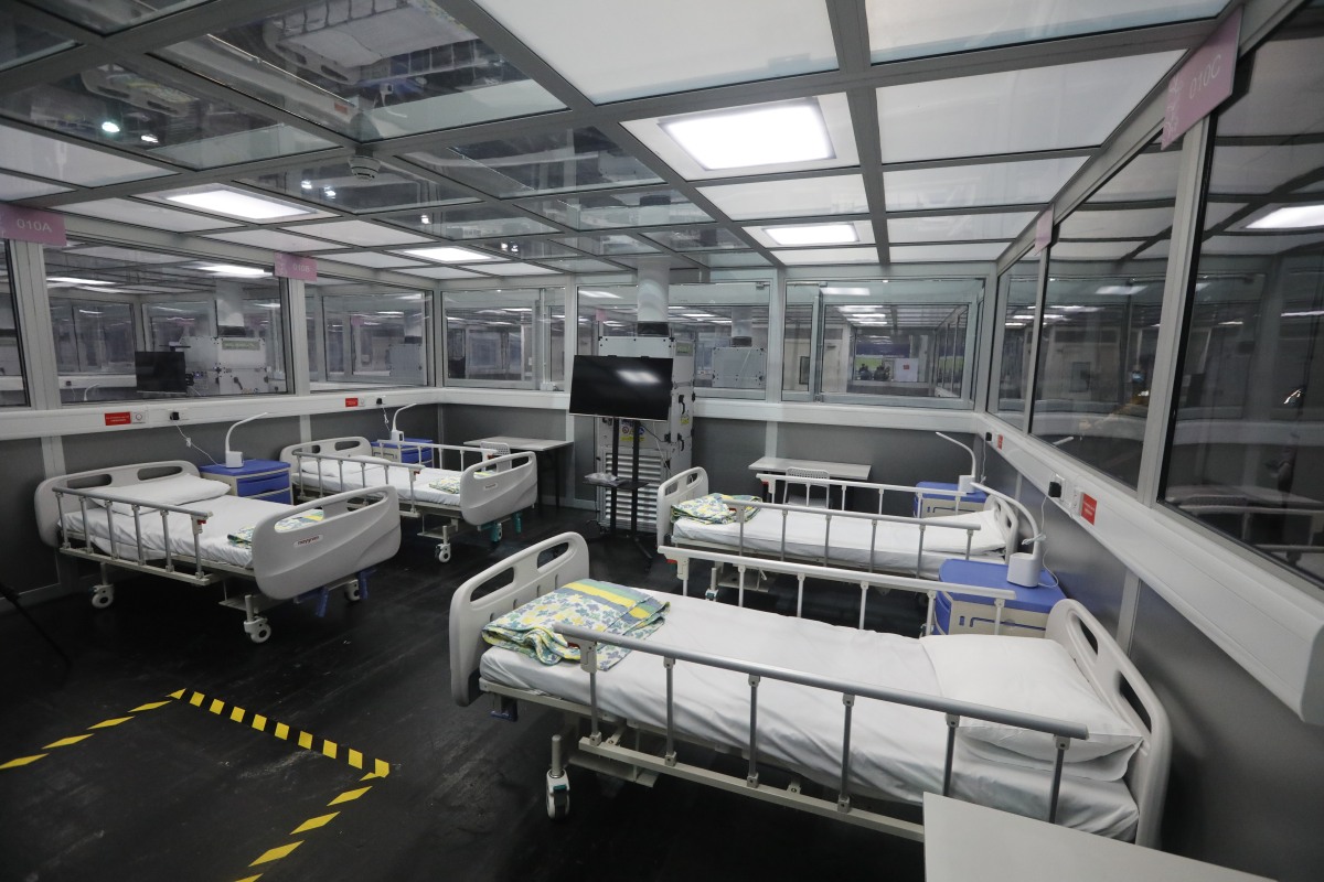 亞博館社區治療設施中的第8號及第10號館明日（3日）起接收新冠確診病人，兩館共可提供500張病床及20個負氣壓治療室。（點新聞記者攝）