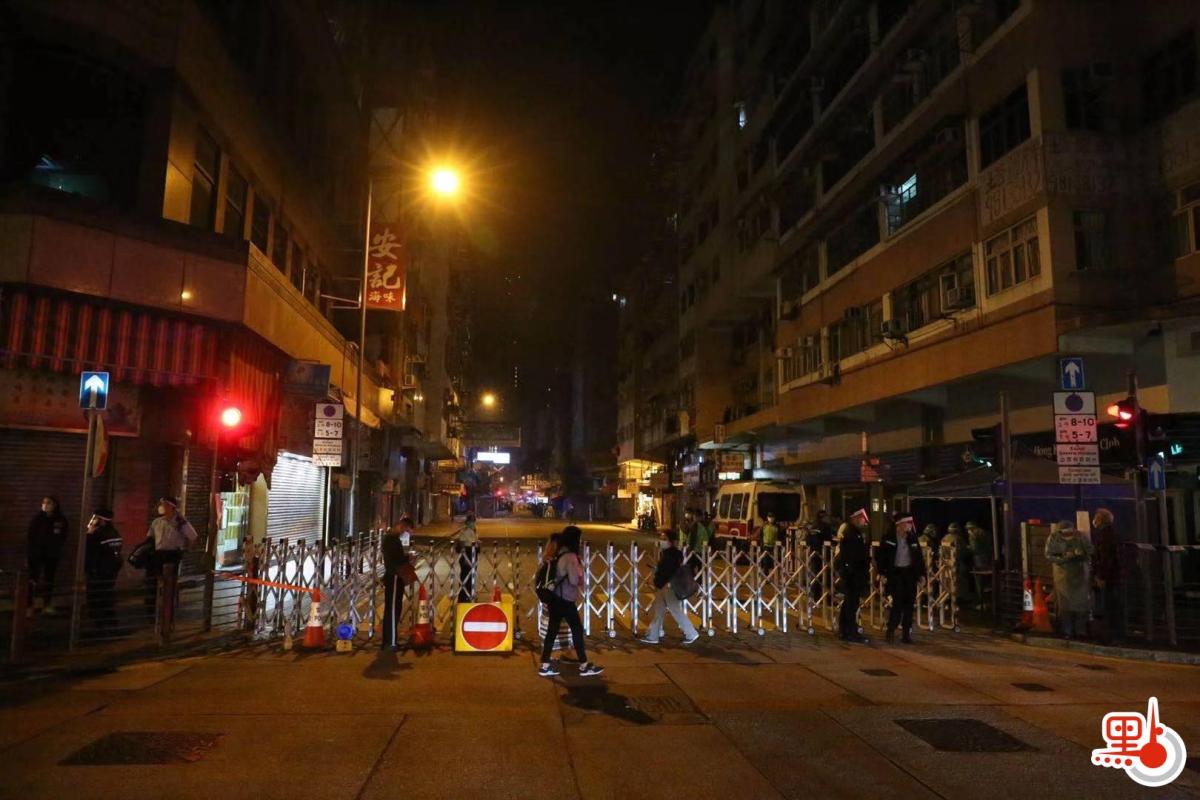 政府今日（23日）凌晨四時宣布，限制佐敦四街（即東至吳松街、南至南京街、西至炮台街、北至甘肅街）範圍內的人強制檢測，受檢人士須在其處所等候，直至區內所有已識別的受檢人士完成檢測，而相關檢測結果亦已獲大致確定，方可離開其處所。政府目標是在約48小時內完成此行動，以達致「同心抗疫，小區『清零』」的目標。午夜起，多架貨車將酒精搓手液、杯面及罐頭等物資運到，作人員在區內架起多個帳篷，警員在甘肅街及上海街交界圍起膠帶，不准車輛進入。