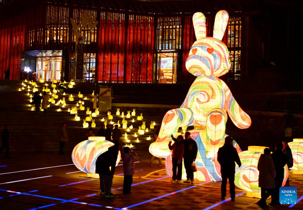 People enjoy lanterns in Xuan'en County of Enshi Tujia and Miao Autonomous Prefecture, central China's Hubei Province, Jan. 17, 2023. This year's Spring Festival, or the Chinese New Year, falls on Jan. 22. (Photo by Song Wen/Xinhua)