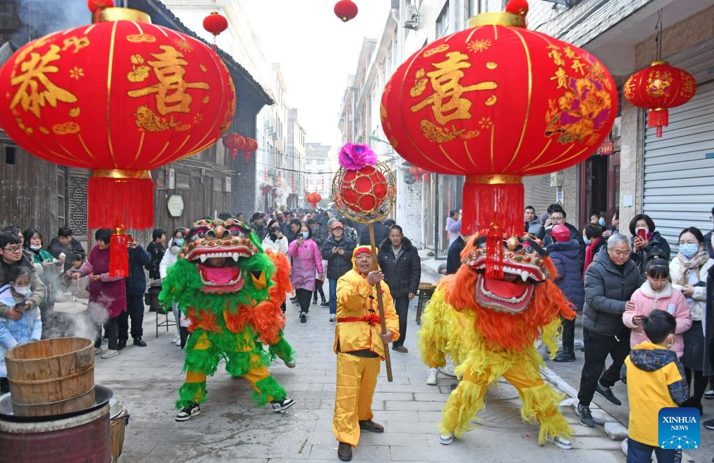 Villagers perform lion dance to celebrate the upcoming Spring Festival in Xianju County of Taizhou City, east China's Zhejiang Province, Jan. 18, 2023. This year's Spring Festival, or the Chinese New Year, falls on Jan. 22. (Photo by Wang Huabin/Xinhua)