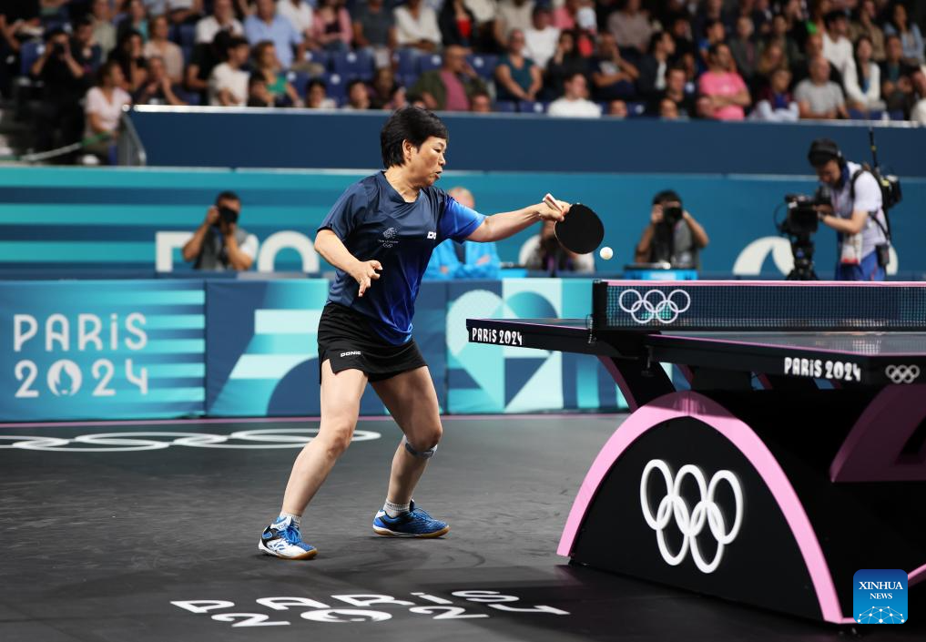 Ni Xialian of Luxembourg competes during the women's singles round of 64 match of table tennis against Sibel Altinkaya of Türkiye at the Paris 2024 Olympic Games in Paris, France, on July 27, 2024. (Xinhua/Wang Dongzhen)