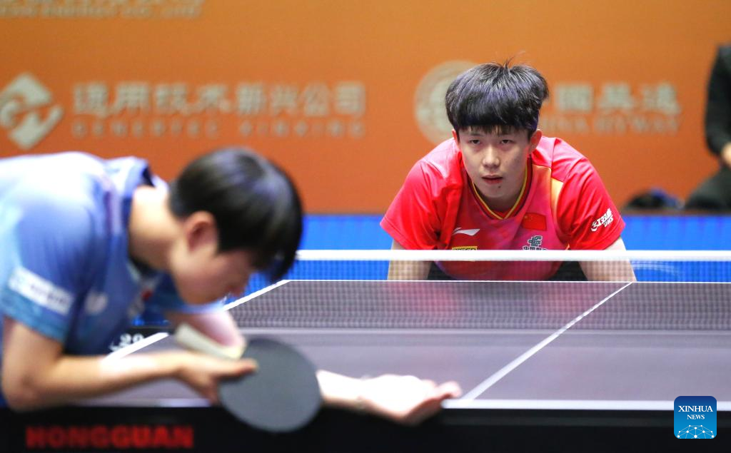 Wang Chuqin (R) of China competes against Oh Junsung of South Korea during the men's singles quarterfinal match at the 27th ITTF-Asian Table Tennis Championships in Astana, Kazakhstan, Oct. 12, 2024. (Photo by Kalizhan Ospanov/Xinhua)
