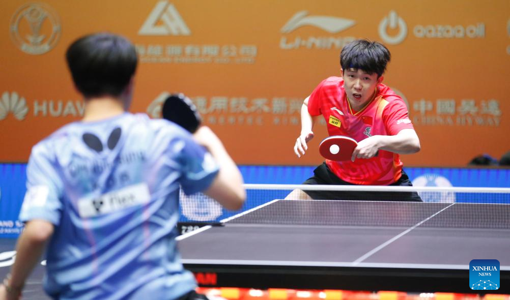 Wang Chuqin (R) of China competes against Oh Junsung of South Korea during the men's singles quarterfinal match at the 27th ITTF-Asian Table Tennis Championships in Astana, Kazakhstan, Oct. 12, 2024. (Photo by Kalizhan Ospanov/Xinhua)