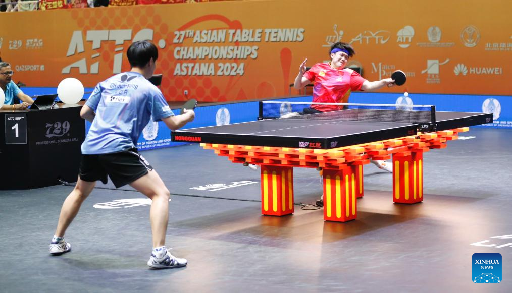 Wang Chuqin (R) of China competes against Oh Junsung of South Korea during the men's singles quarterfinal match at the 27th ITTF-Asian Table Tennis Championships in Astana, Kazakhstan, Oct. 12, 2024. (Photo by Kalizhan Ospanov/Xinhua)