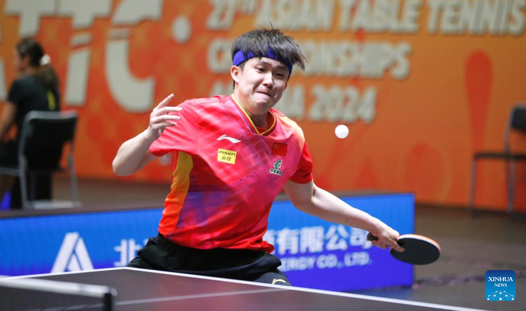 Wang Chuqin of China hits a return against Oh Junsung of South Korea during the men's singles quarterfinal match at the 27th ITTF-Asian Table Tennis Championships in Astana, Kazakhstan, Oct. 12, 2024. (Photo by Kalizhan Ospanov/Xinhua)