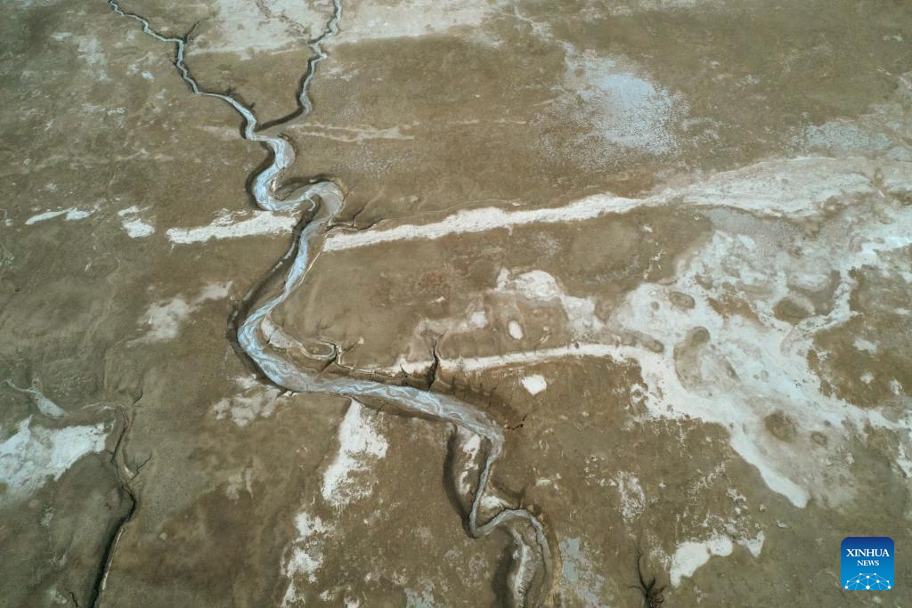 An aerial drone photo taken on March 29, 2025 shows the shoreline of the northern part of the Dead Sea, about 30 kilometers east of Jerusalem. The Dead Sea's declining water level has led to underground salt erosion, causing widespread ground collapse and the formation of sinkholes along the shoreline. (Xinhua)