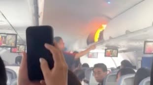 Watch This | Passenger's luggage catches fire on China-S. Korea flight