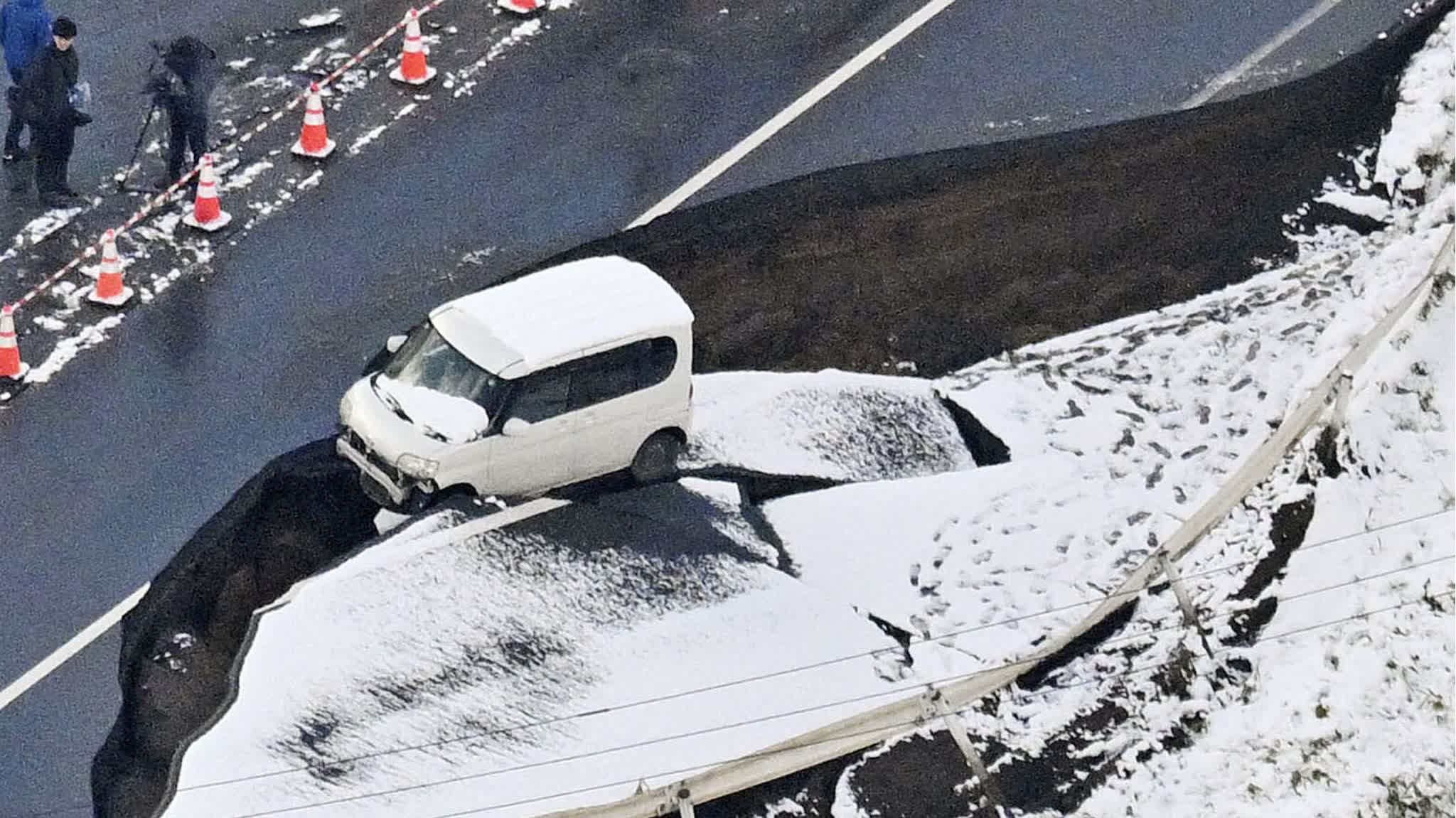 Photos | Strong earthquake in Aomori, Japan causes road sinkholes and bursting water pipes