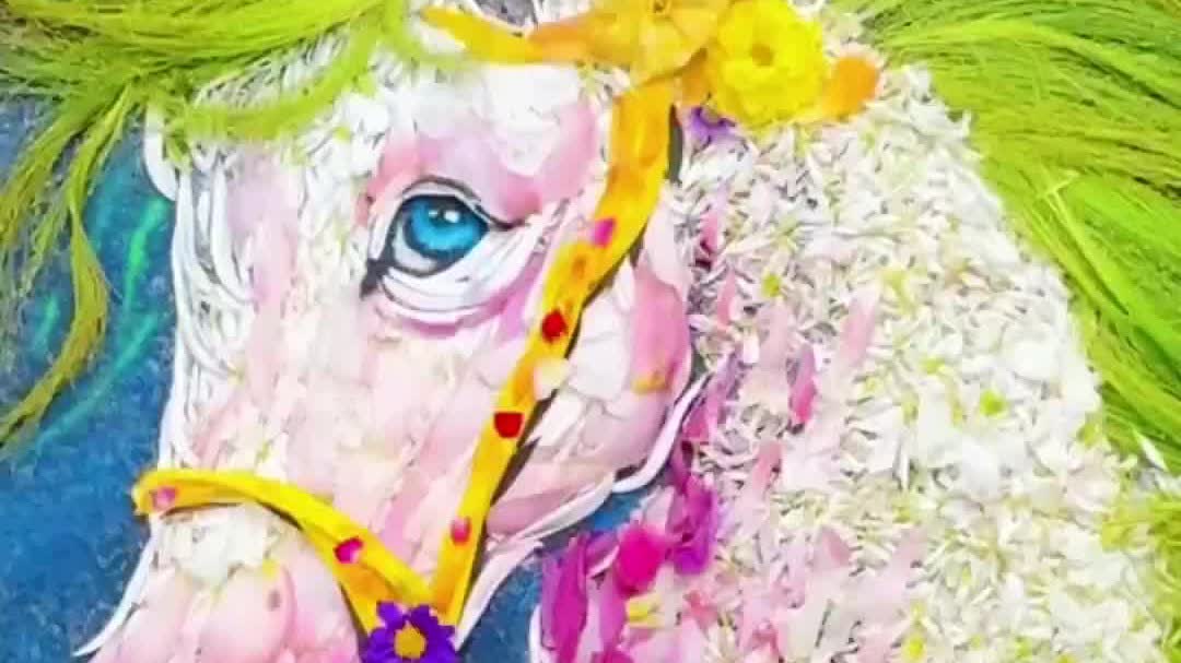 Watch This | Flower petals form galloping horse