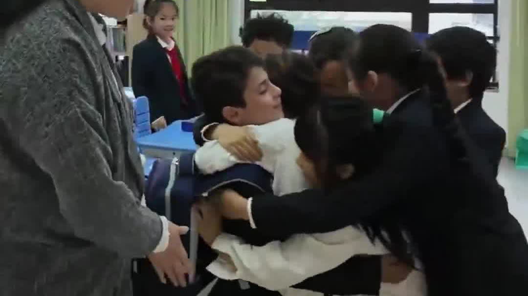 Watch This | Iranian boy returns to class in China after 102 days