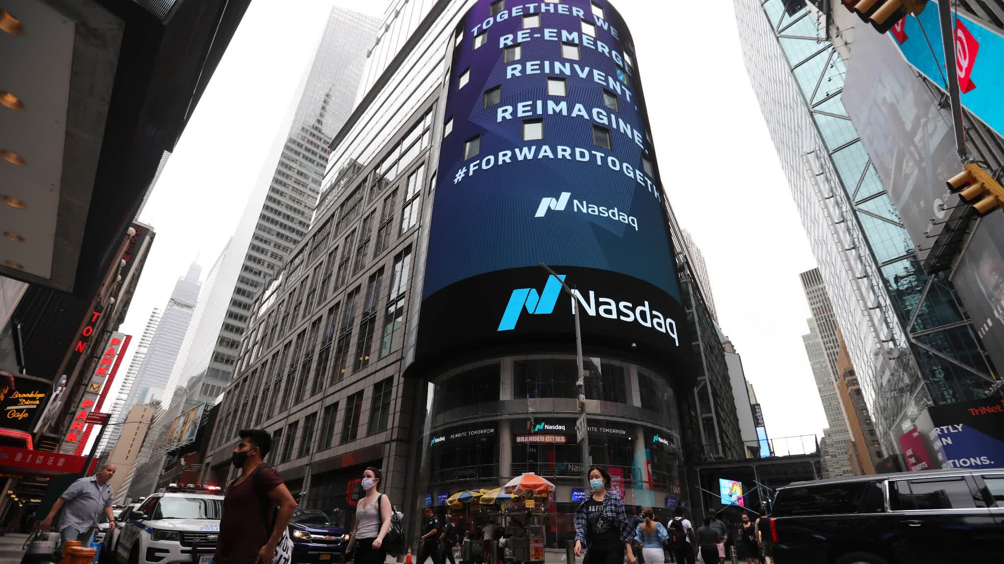 US stocks finish higher after jobs report, chip deal