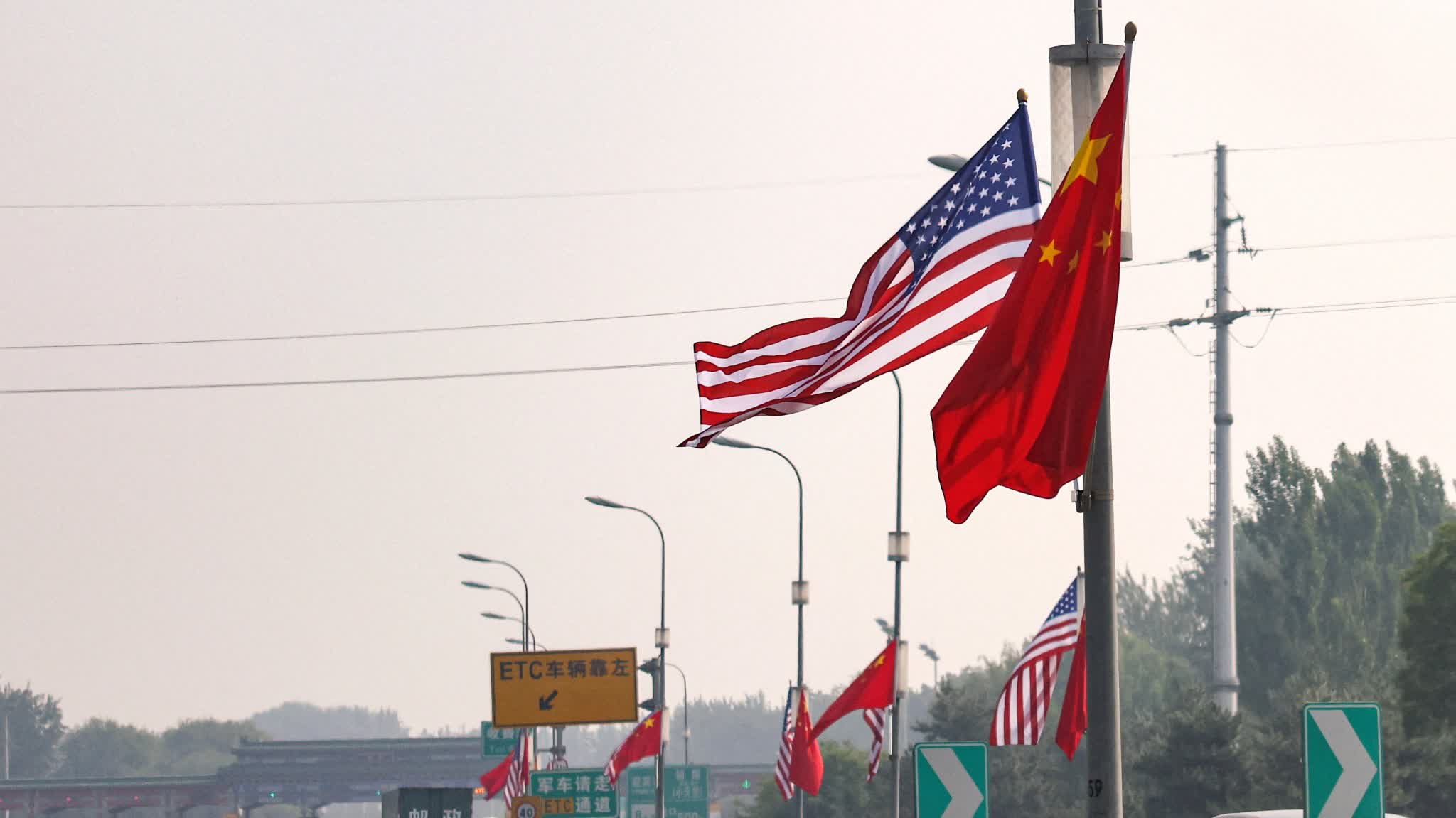Trump's China visit: US and Chinese flags fly side by side on Beijing streets