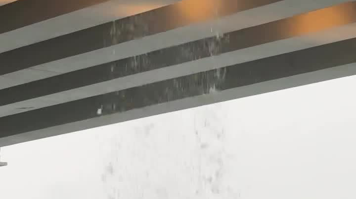 Watch This | Heavy rain creates 'waterfall' on East Coast Boardwalk