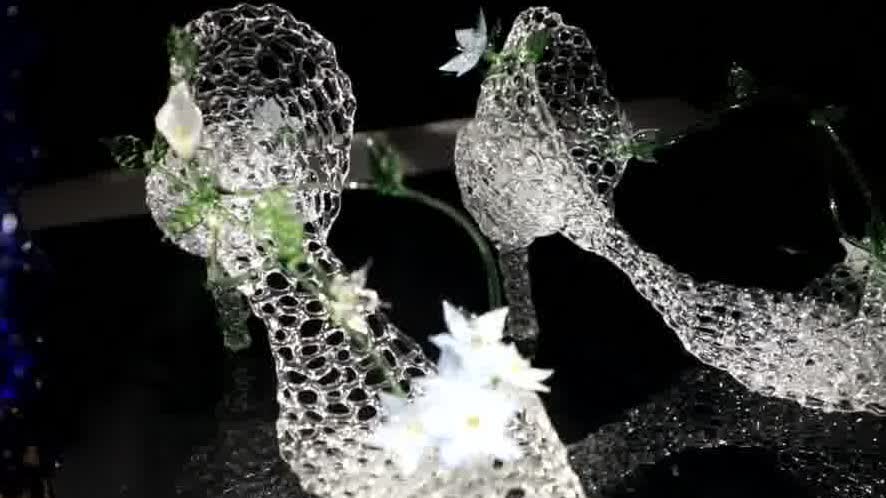 Watch This | How 10,000 colored glass rings became a dazzling dress