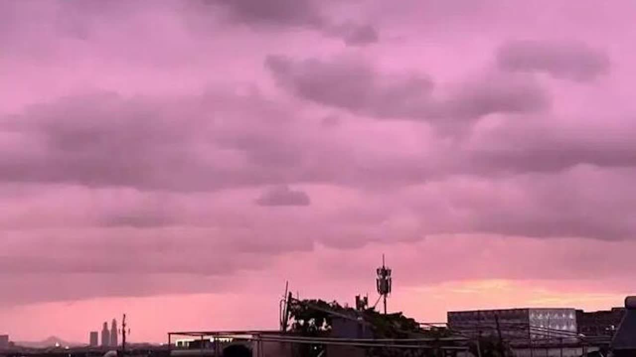 Watch This | Pink and purple 'typhoon sunset glow' lights up Hangzhou ahead of Typhoon Bavi landfall