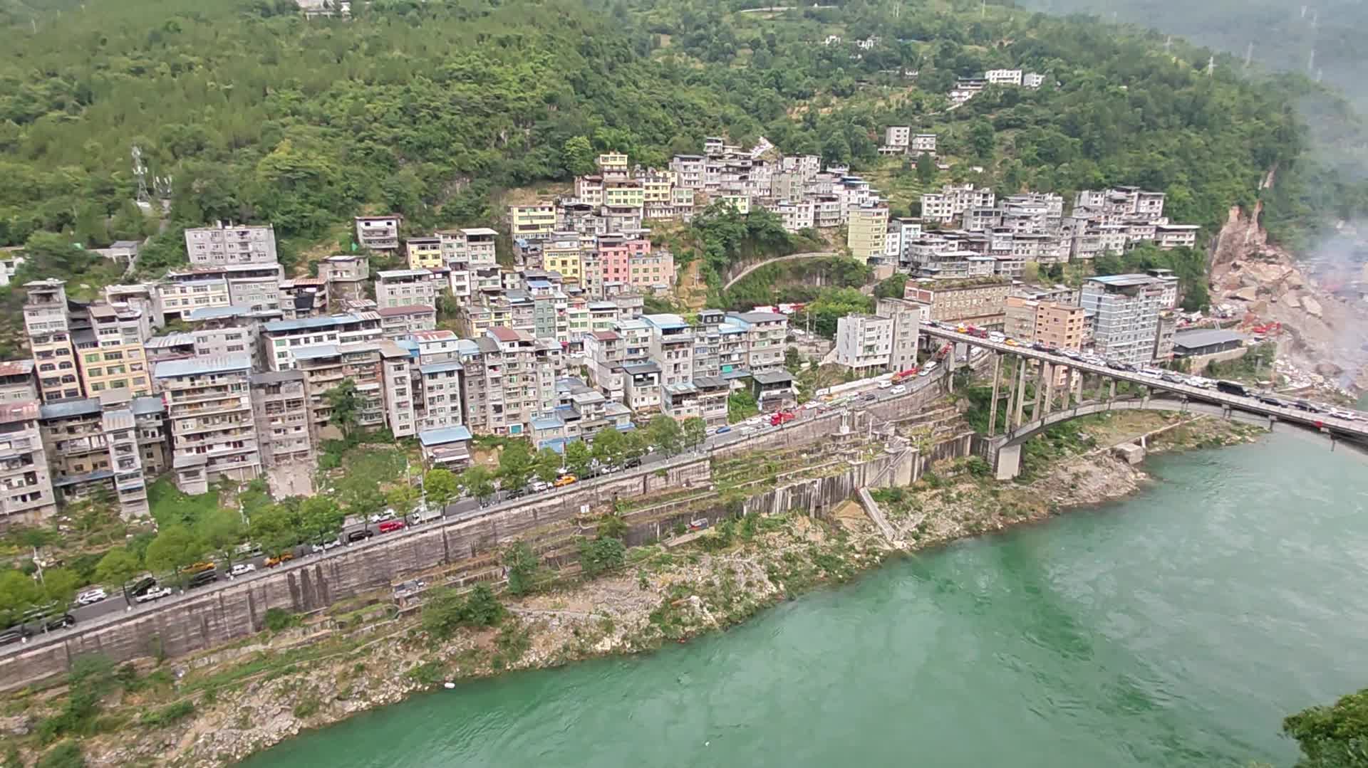 Watch This | Rescuers battle difficult terrain after landslide buries homes in southwest China's Chongqing