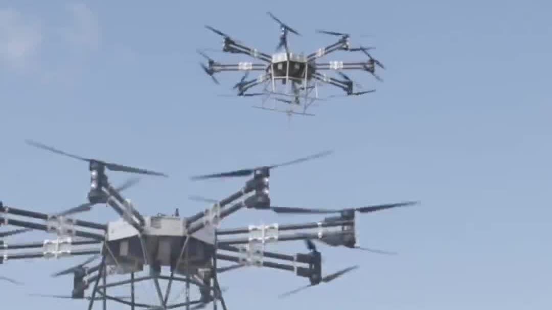 Watch This | Six drones team up to lift 780-kg power grid component in China's Yunnan