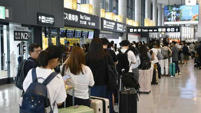 Thousands stranded at Japan's Narita airport after record rain kills 8
