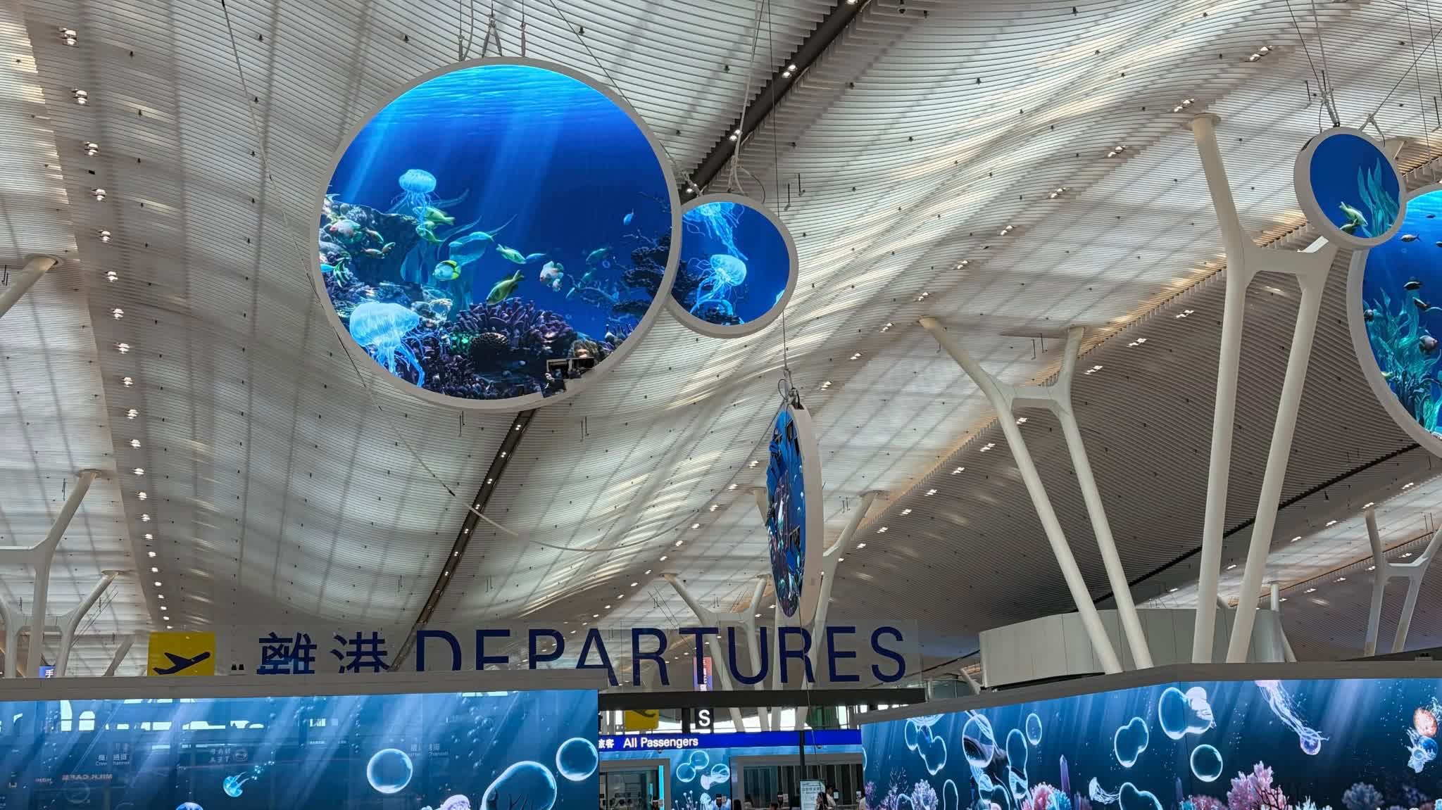 Watch This | Screen dangles from ceiling at HK airport T2, area cordoned off