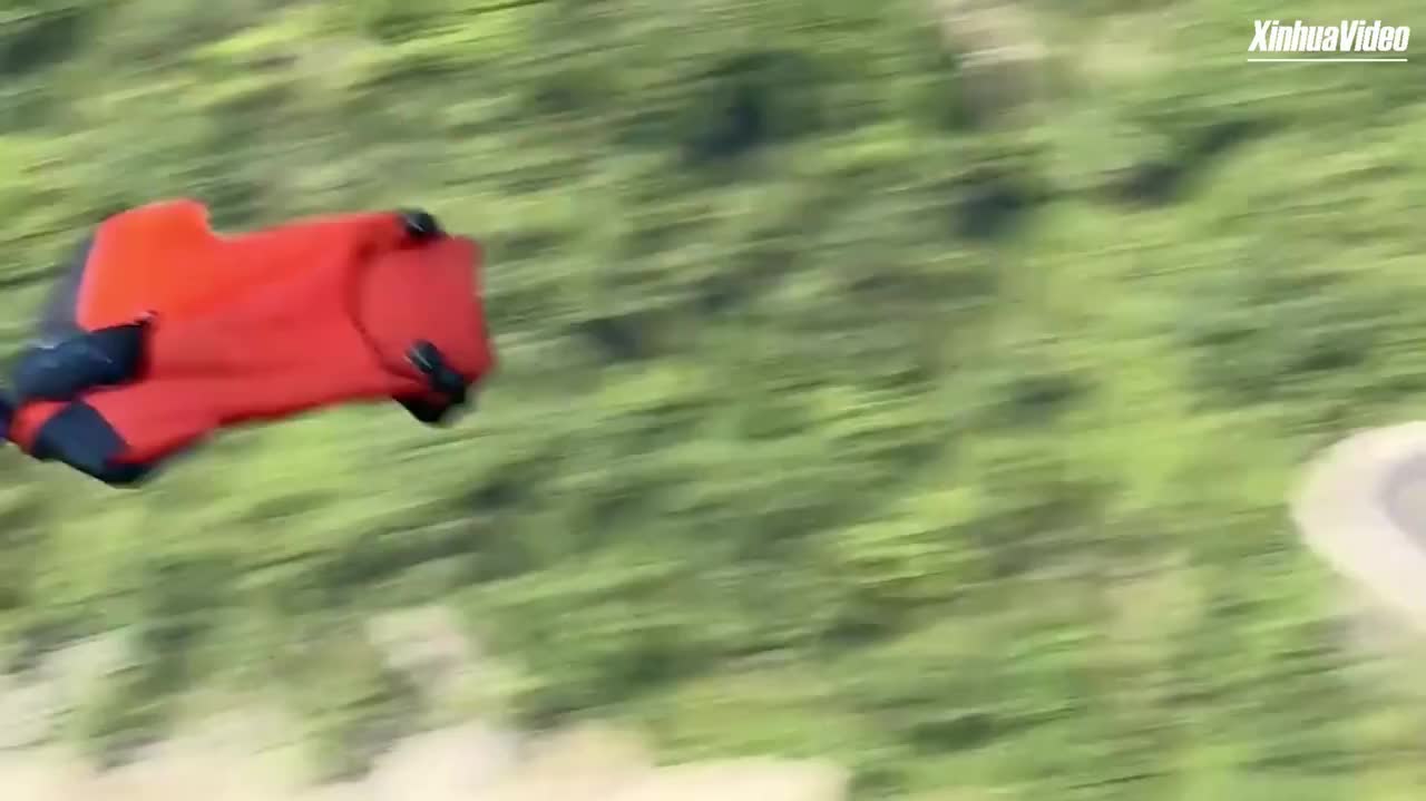 Watch This | Wingsuit flying over China's Tianmen Mountain