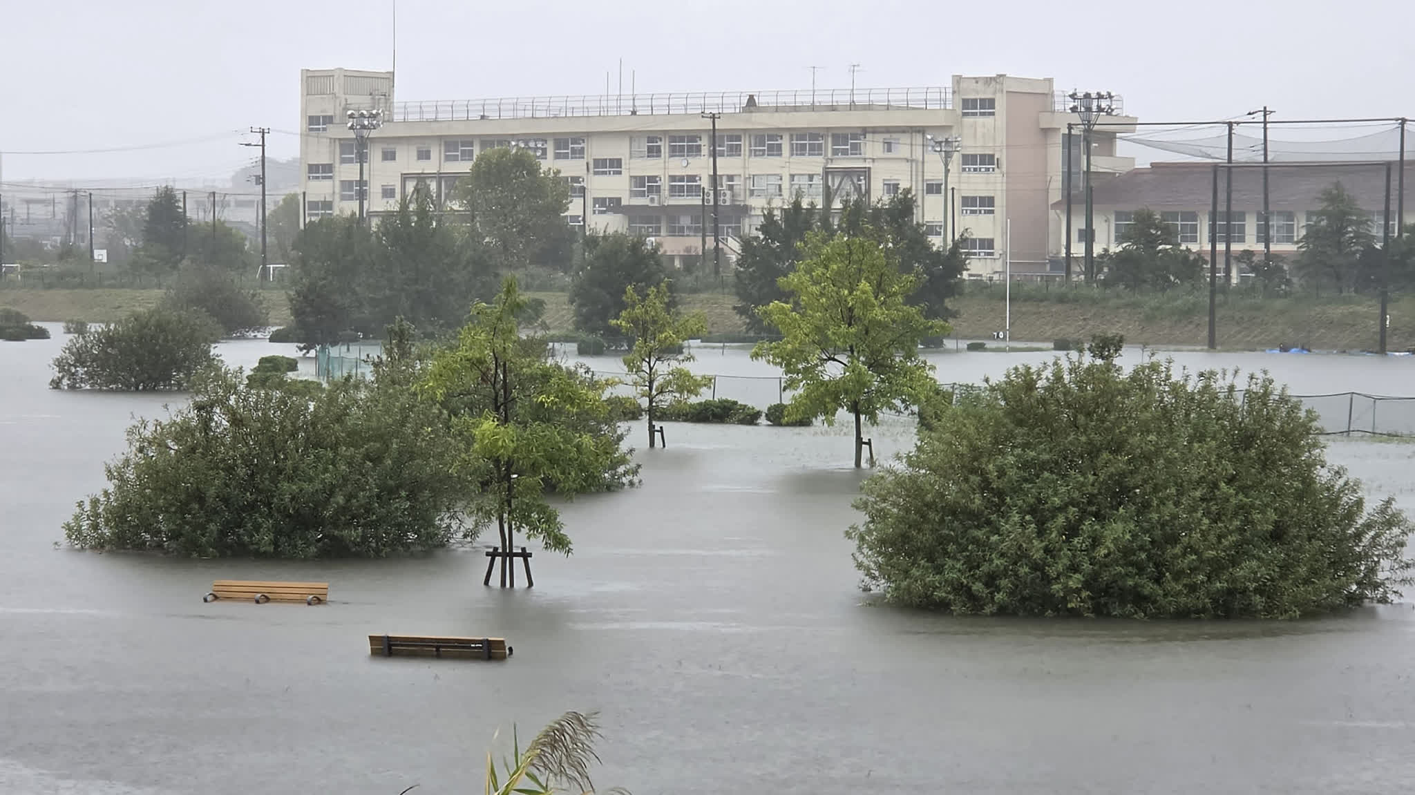 Typhoon Dujuan hits Japan, 500 flights canceled at Tokyo airports, landslides leave 2 dead