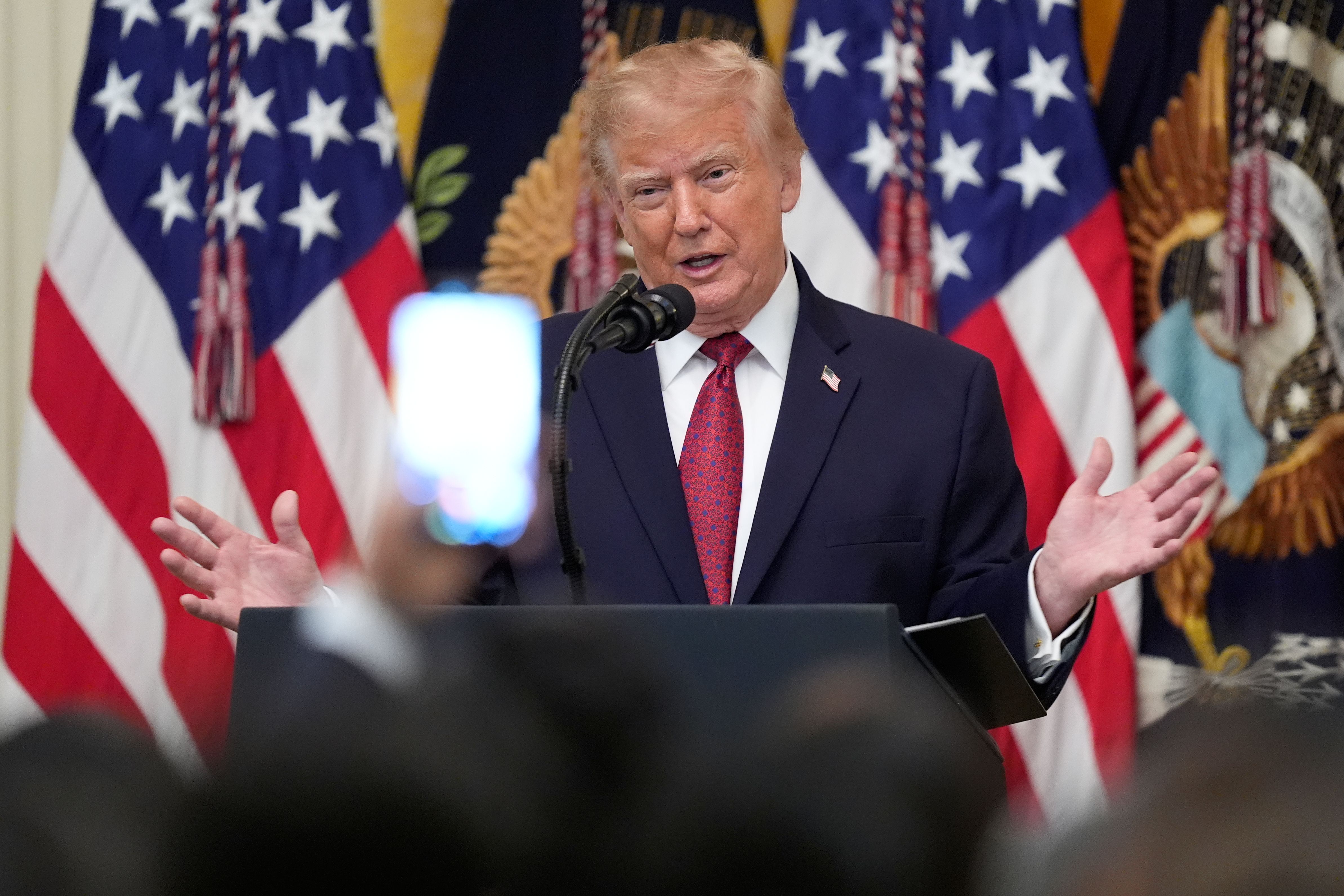 Trump speaks to reporters before boarding Marine One at the White House, October 1, 2026. (AP file photo)