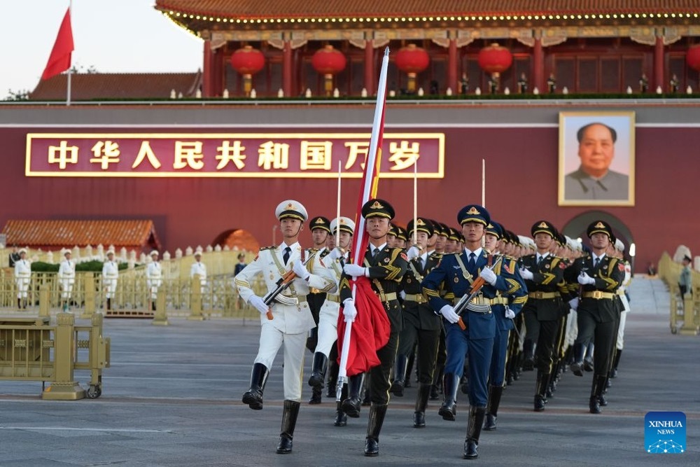 A flag-raising ceremony marking the 77th anniversary of the founding of the People's Republic of China is held at Tian'anmen Square in Beijing, capital of China, Oct. 1, 2026. (Xinhua)