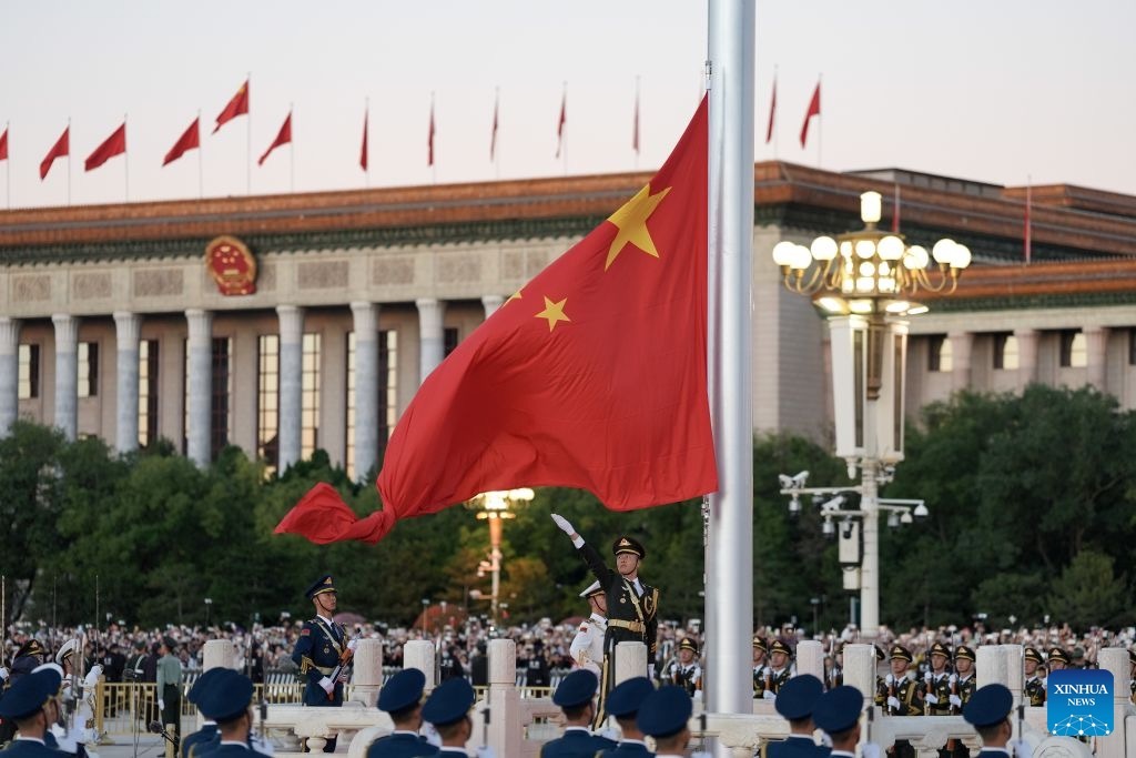 A flag-raising ceremony marking the 77th anniversary of the founding of the People's Republic of China is held at Tian'anmen Square in Beijing, capital of China, Oct. 1, 2026. (Xinhua)