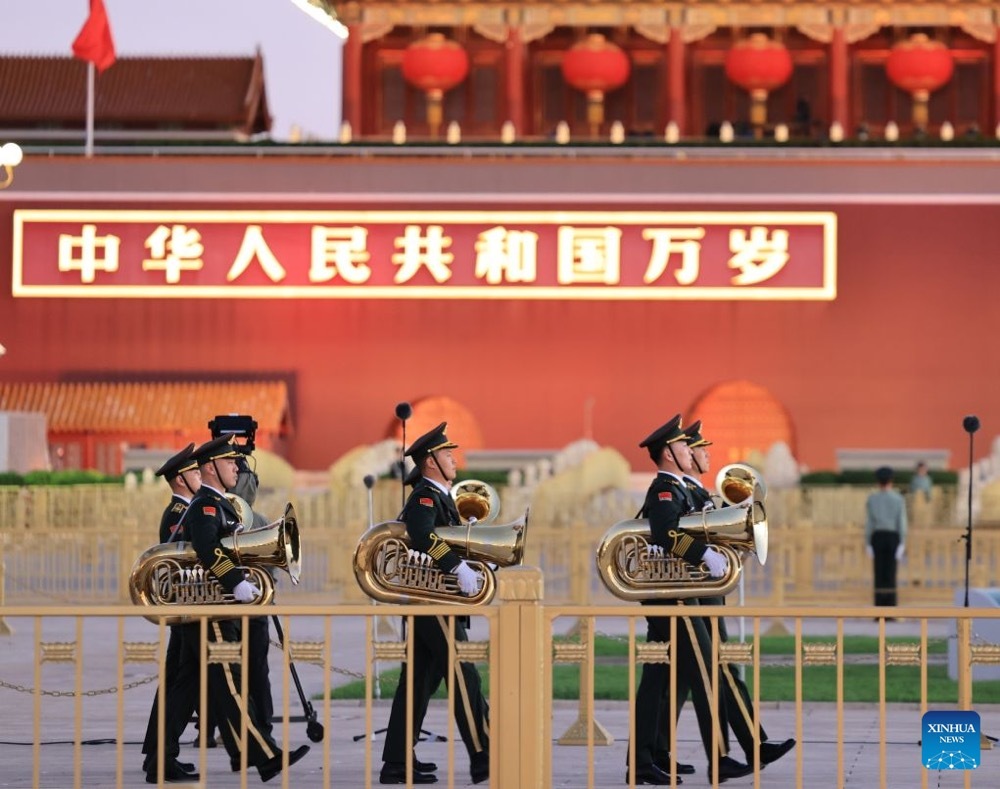 A flag-raising ceremony marking the 77th anniversary of the founding of the People's Republic of China is held at Tian'anmen Square in Beijing, capital of China, Oct. 1, 2026. (Xinhua)