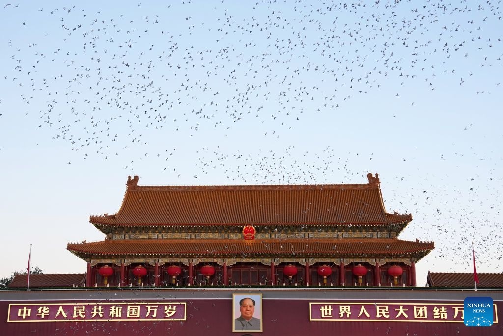 Doves are released after a flag-raising ceremony marking the 77th anniversary of the founding of the People's Republic of China at Tian'anmen Square in Beijing, capital of China, Oct. 1, 2026. (Xinhua)