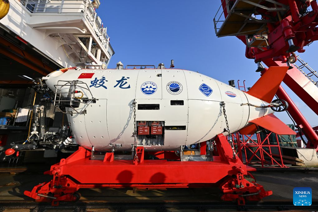 The manned deep-sea submersible Jiaolong is pictured outside its hangar aboard the research vessel Deep Sea No. 1 in the western Pacific Ocean, on Oct. 10, 2026. China's research vessel Deep Sea No. 1, carrying manned deep-sea submersible Jiaolong, arrived at East Caroline Basin in the western Pacific Ocean on Saturday for deep-sea scientific research.
This marks the 466th dive of Jiaolong, with a planned diving depth of about 4,500 meters. (Xinhua)