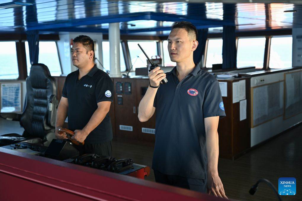 The manned deep-sea submersible Jiaolong is pictured outside its hangar aboard the research vessel Deep Sea No. 1 in the western Pacific Ocean, on Oct. 10, 2026. China's research vessel Deep Sea No. 1, carrying manned deep-sea submersible Jiaolong, arrived at East Caroline Basin in the western Pacific Ocean on Saturday for deep-sea scientific research.
This marks the 466th dive of Jiaolong, with a planned diving depth of about 4,500 meters. (Xinhua)