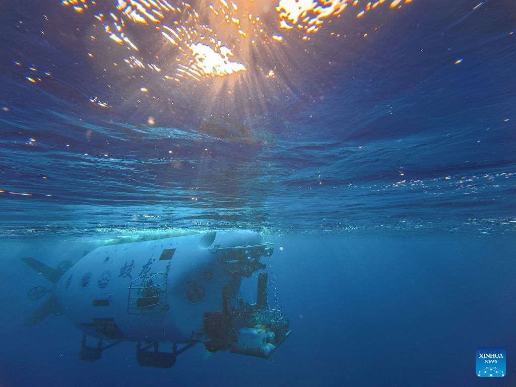 The manned deep-sea submersible Jiaolong is pictured outside its hangar aboard the research vessel Deep Sea No. 1 in the western Pacific Ocean, on Oct. 10, 2026. China's research vessel Deep Sea No. 1, carrying manned deep-sea submersible Jiaolong, arrived at East Caroline Basin in the western Pacific Ocean on Saturday for deep-sea scientific research.
This marks the 466th dive of Jiaolong, with a planned diving depth of about 4,500 meters. (Xinhua)