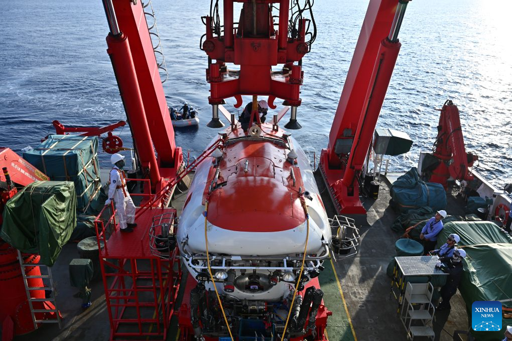 The manned deep-sea submersible Jiaolong is pictured outside its hangar aboard the research vessel Deep Sea No. 1 in the western Pacific Ocean, on Oct. 10, 2026. China's research vessel Deep Sea No. 1, carrying manned deep-sea submersible Jiaolong, arrived at East Caroline Basin in the western Pacific Ocean on Saturday for deep-sea scientific research.
This marks the 466th dive of Jiaolong, with a planned diving depth of about 4,500 meters. (Xinhua)