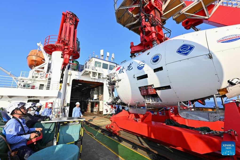 The manned deep-sea submersible Jiaolong is pictured outside its hangar aboard the research vessel Deep Sea No. 1 in the western Pacific Ocean, on Oct. 10, 2026. China's research vessel Deep Sea No. 1, carrying manned deep-sea submersible Jiaolong, arrived at East Caroline Basin in the western Pacific Ocean on Saturday for deep-sea scientific research.
This marks the 466th dive of Jiaolong, with a planned diving depth of about 4,500 meters. (Xinhua)