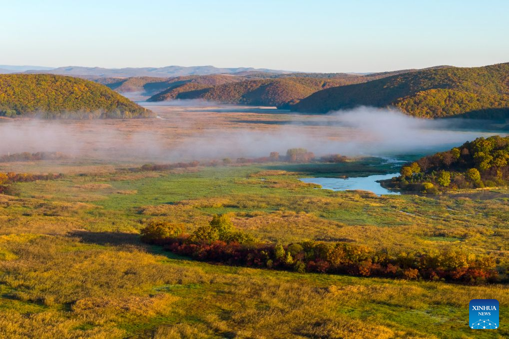 An aerial drone photo taken on Oct. 7, 2026 shows the autumn scenery at the Jingpohu Global Geopark in Mudanjiang City, northeast China's Heilongjiang Province. (Wang Baoxun/Xinhua)